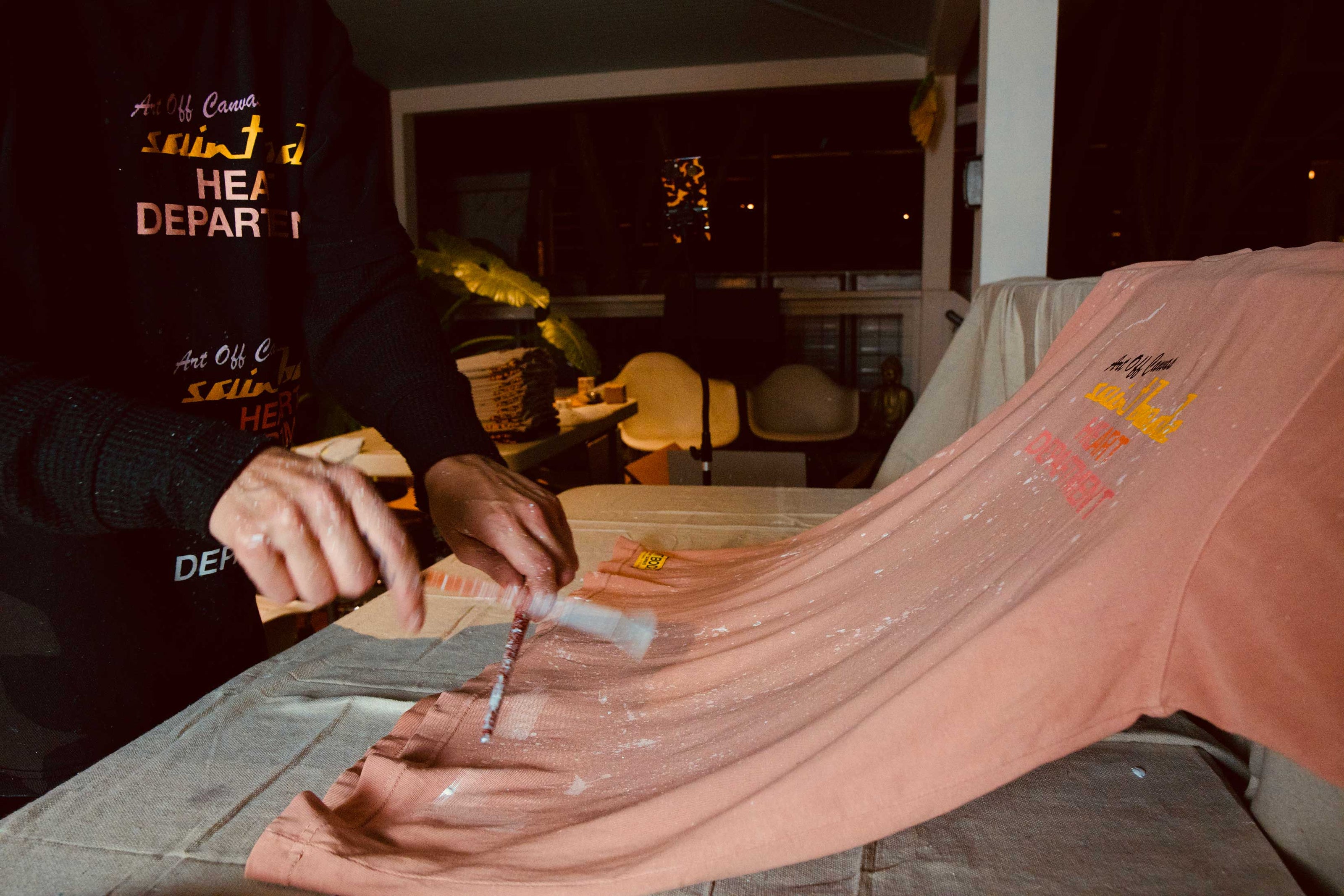 Bode Robinson hand painting Saint Bode t-shirts